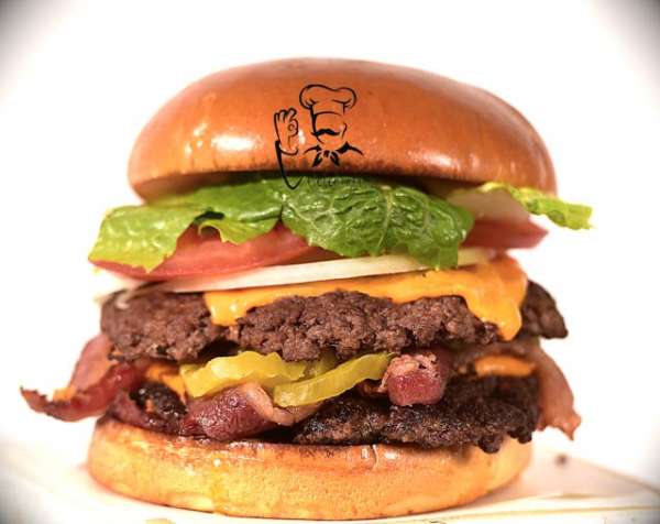 American cheese, lettuce, tomatoes, onions, pickles, ketchup